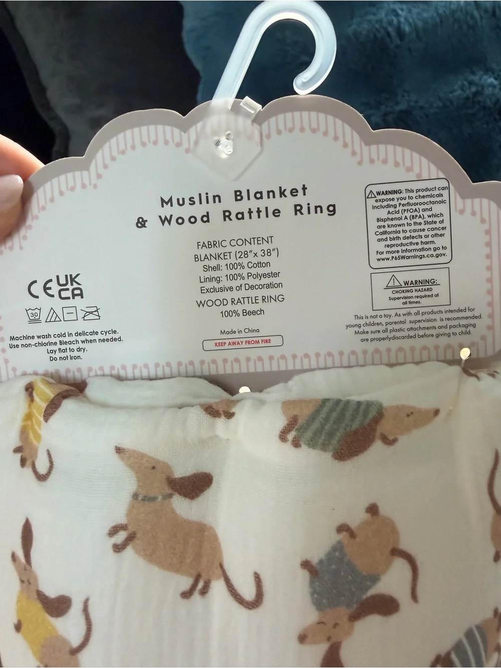 Dachshund Cream Muslin Baby Blanket with Wooden Rattle Ring